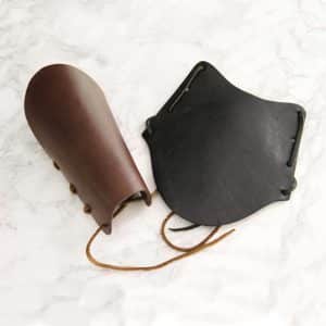 Kuvioimaton nahkainen käsivarren suoja